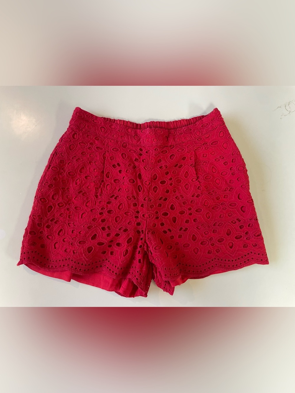 High-Rise Eyelet Shorts in Bright Red